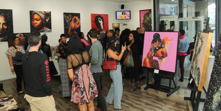 A crowd at Tiffanie Anderson's art gallery at WACO Theater Center